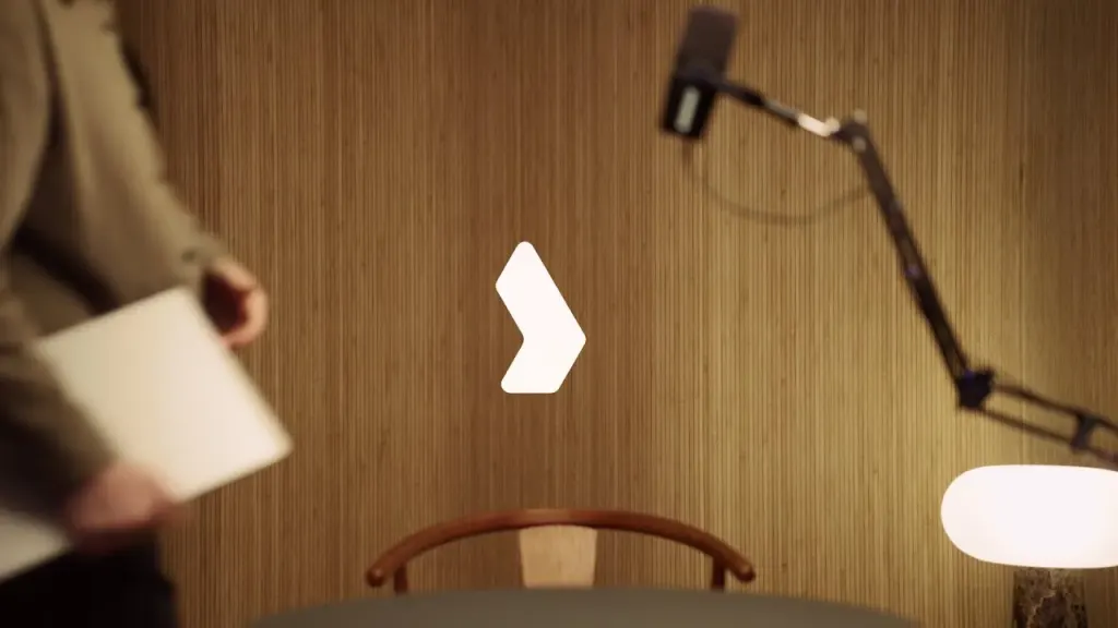 Still from the Langdock video: the Langdock mark against a wooden wall